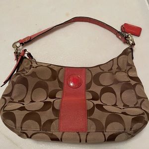Coach signature hobo with orange accents
